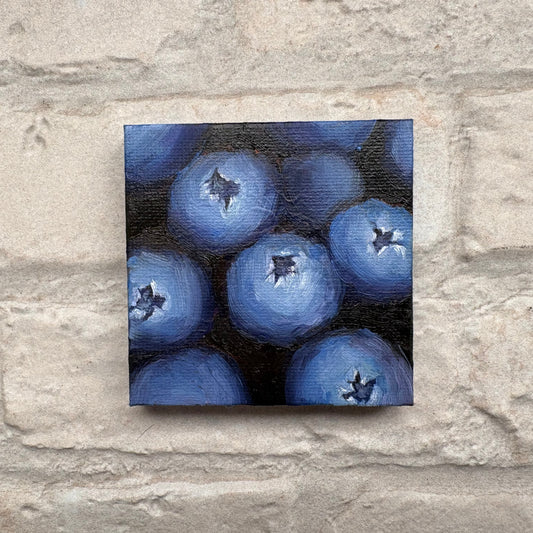 Square painting of blueberries on a mini canvas