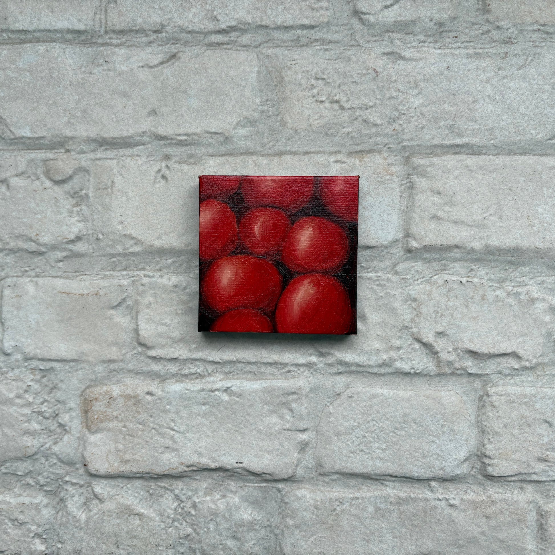 Square painting of cherry tomatoes on a mini canvas