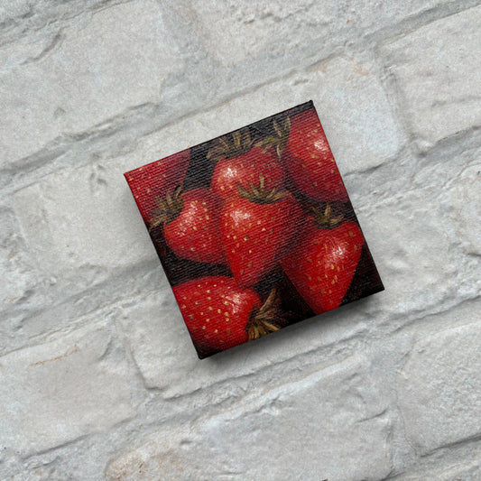 Square painting of strawberries on a mini canvas