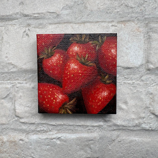 Square painting of strawberries on a mini canvas